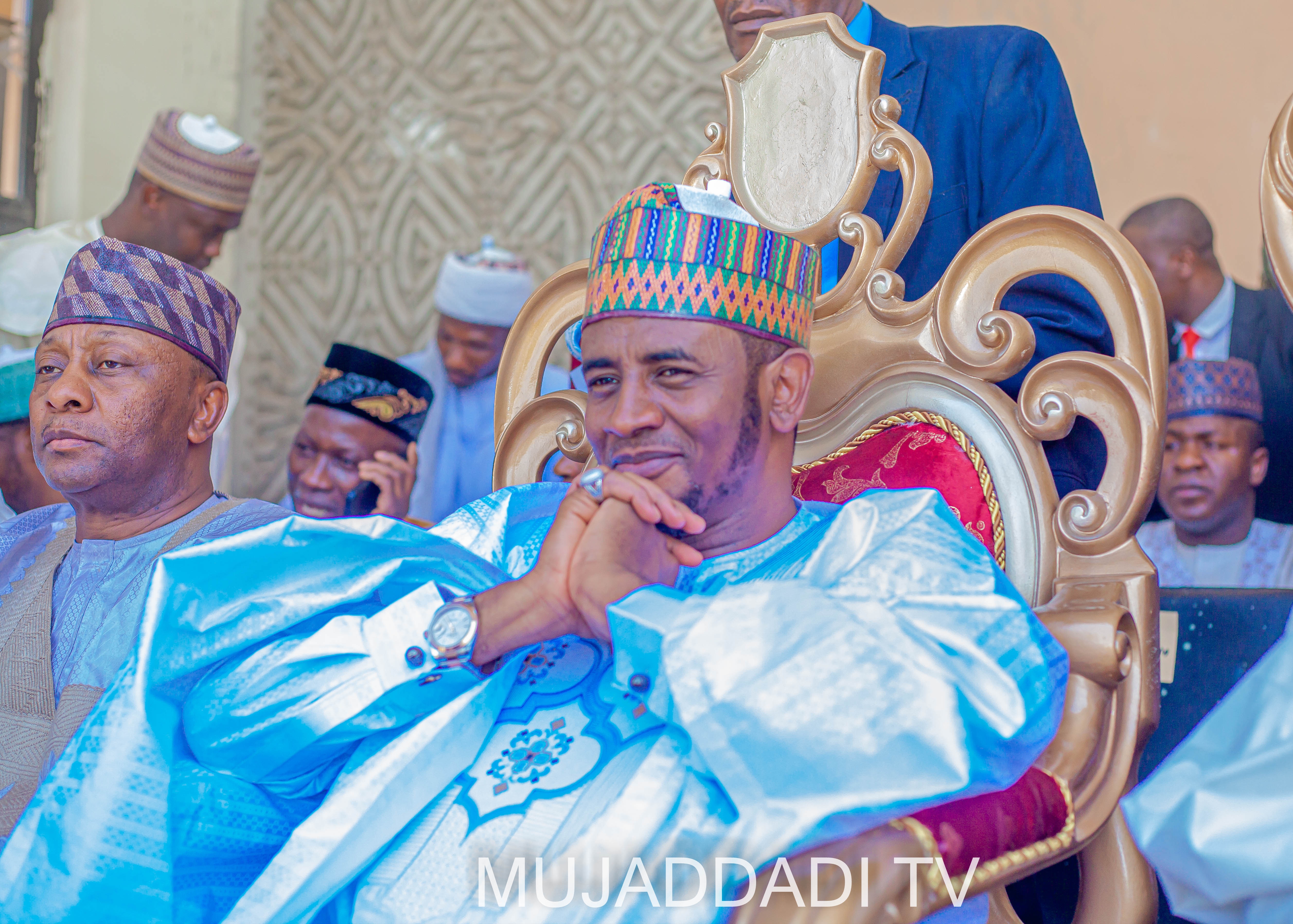 Senator Buba seated at a ceremonial event