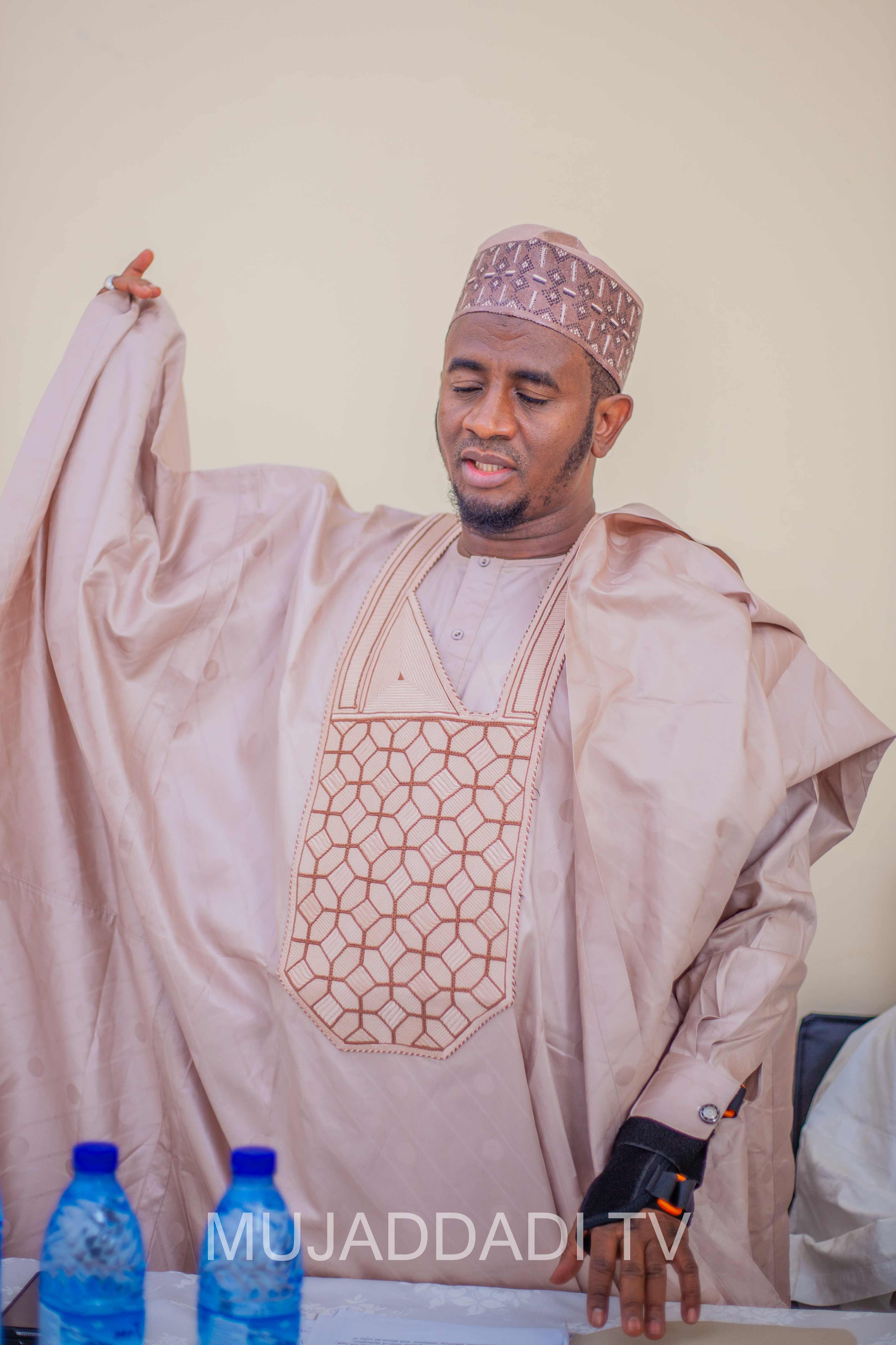 Senator Buba speaking at a meeting