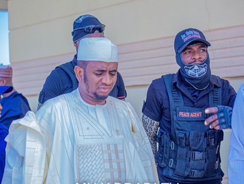 Senator Buba addressing constituents with a microphone